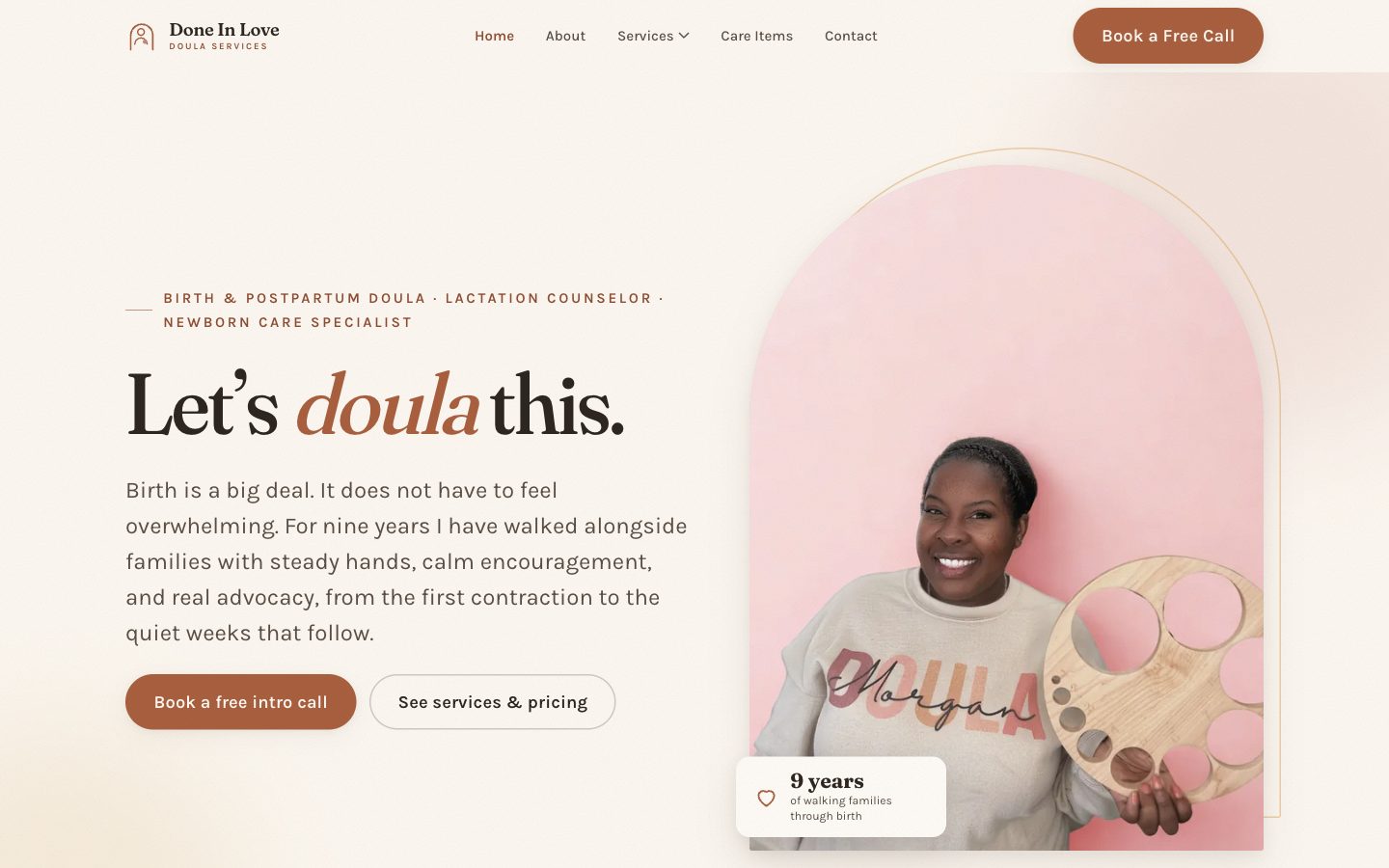 Done In Love Doula Services homepage: the headline “Let’s doula this.” beside a portrait of the doula holding a placenta model